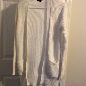 White cardigan with pockets